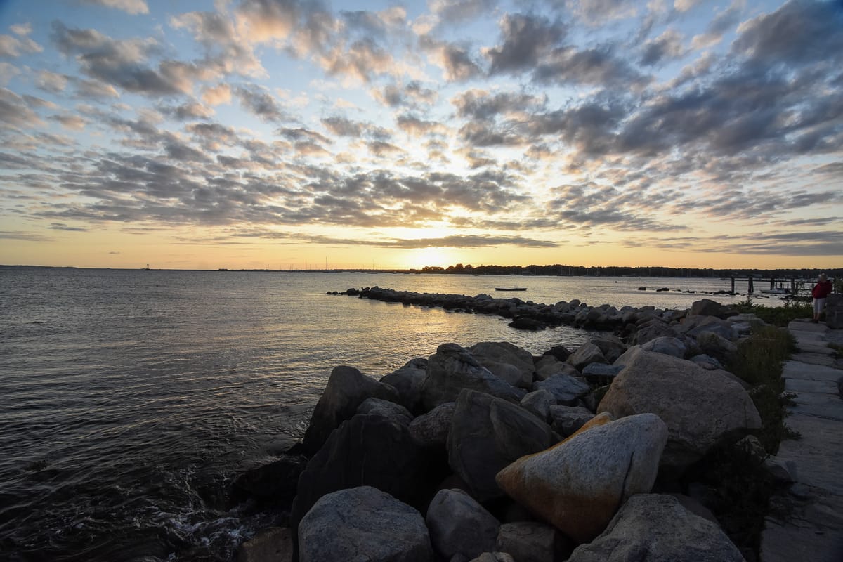 Sunset over a rocky shoreline